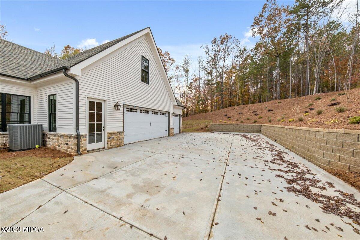 110 Birch Circle Forsyth, GA 31029 - Photo 39 of 44 a view of a white house with a snow on the road