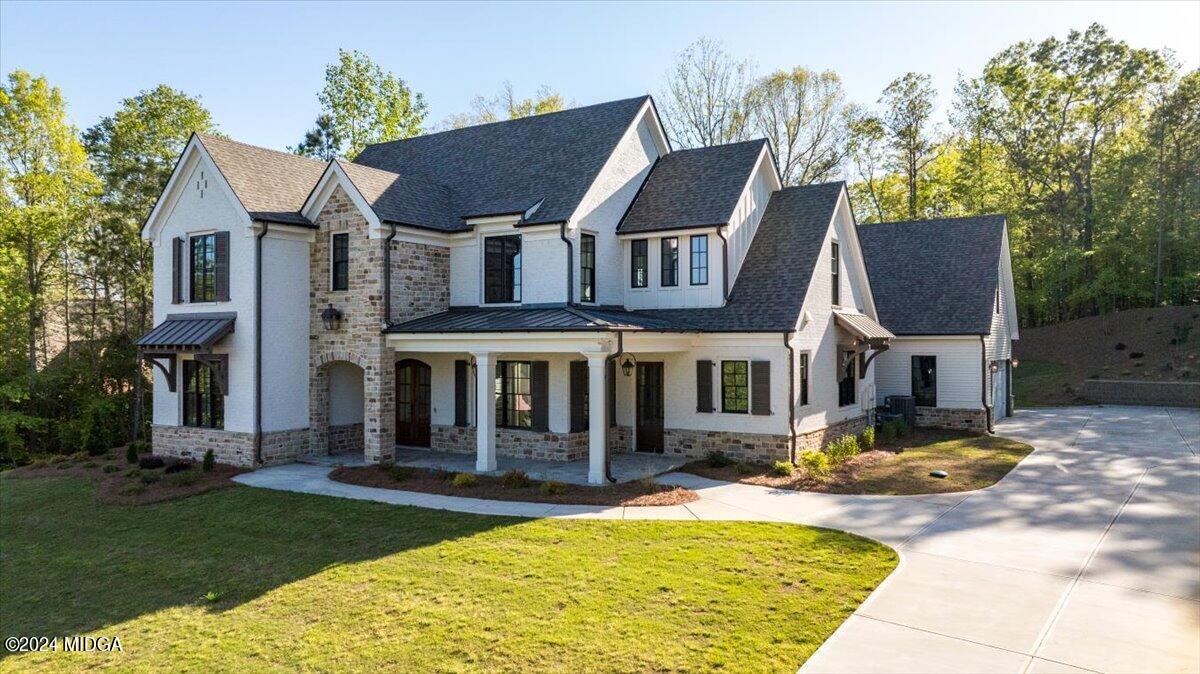 110 Birch Circle Forsyth, GA 31029 - Photo 44 of 44 a view of a house with swimming pool and sitting area
