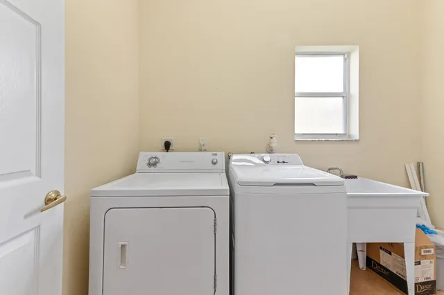 a utility room with dryer and washer