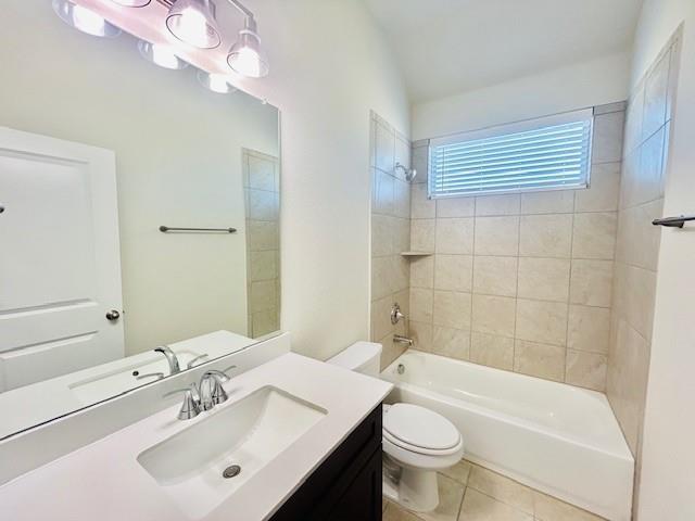 4219 Hummingbird Drive Sherman, TX 75092 - Photo 13 of 16 a bathroom with a sink a toilet and shower
