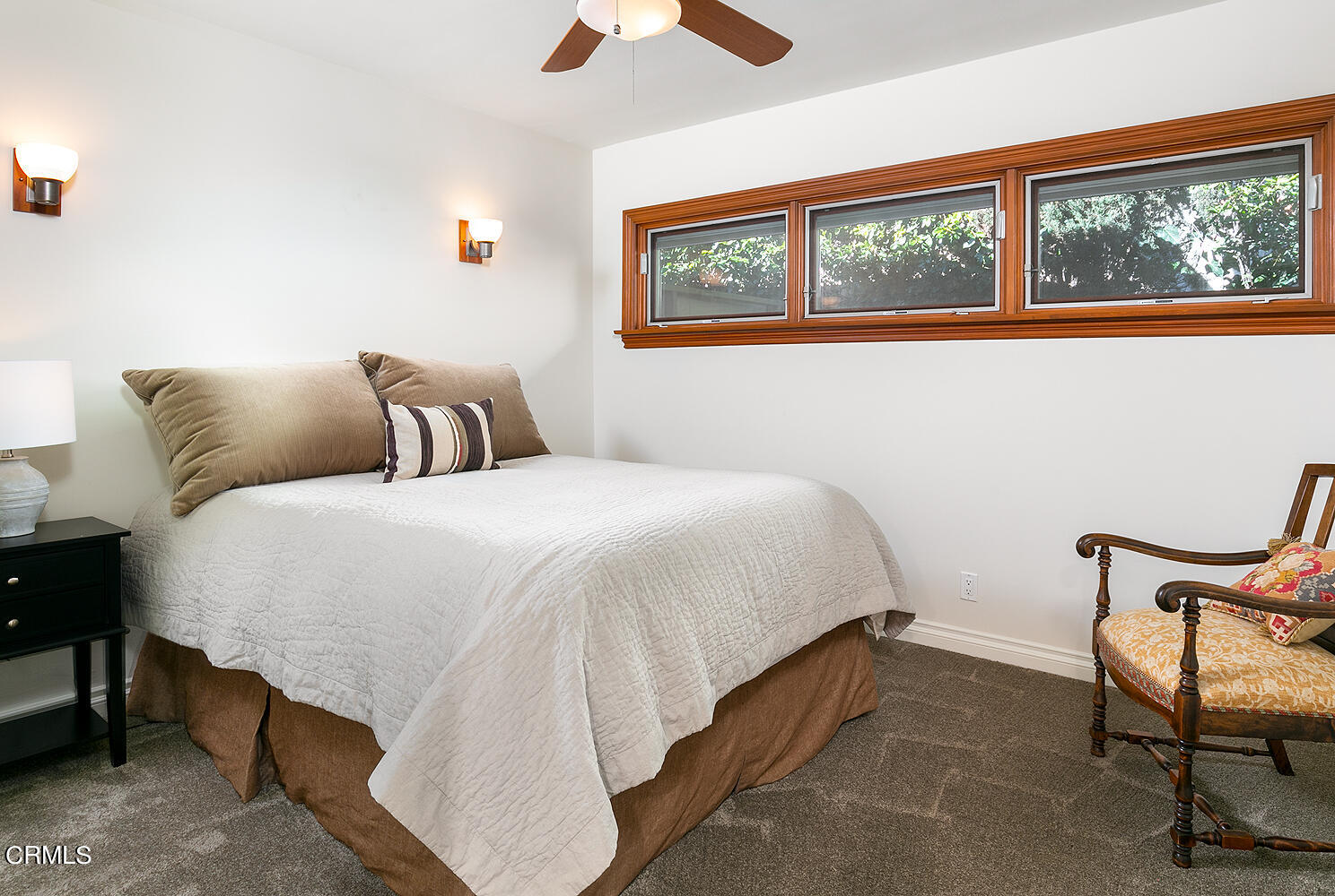 1563 Meadowbrook Road Altadena, CA 91001 - Photo 28 of 38 a bedroom with a bed a chair and next to a window