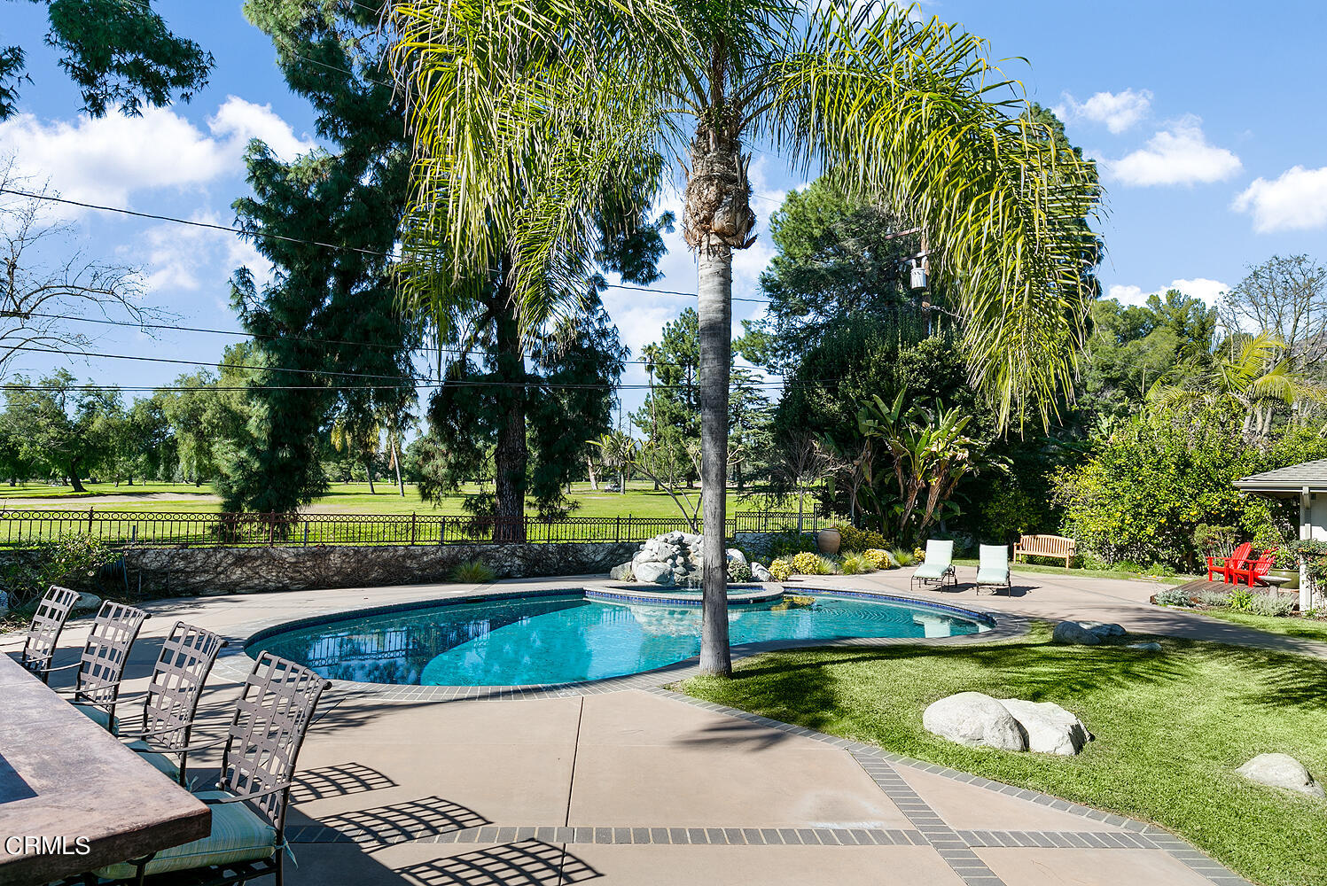1563 Meadowbrook Road Altadena, CA 91001 - Photo 32 of 38 a view of a swimming pool with a patio and a yard