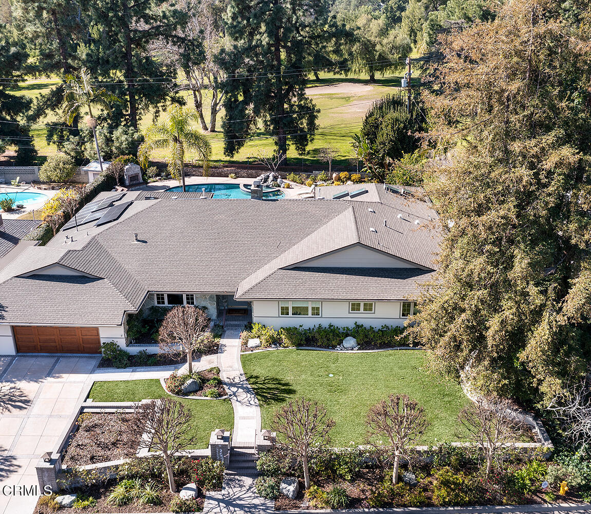 1563 Meadowbrook Road Altadena, CA 91001 - Photo 38 of 38 a view of a patio with table and chairs and potted plants