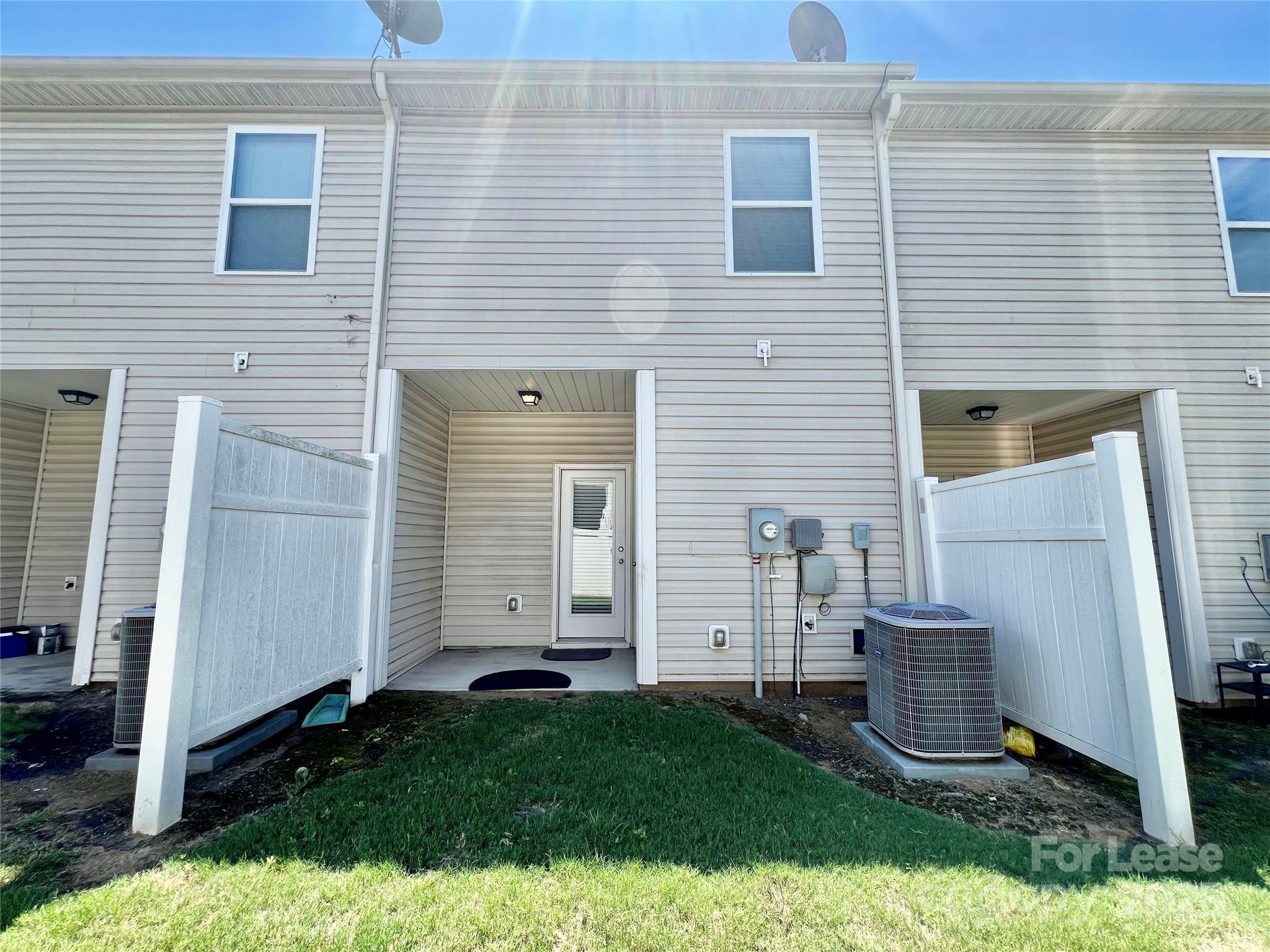 12712 Persimmon Tree Drive Charlotte, NC 28273 - Photo 5 of 9 a view of house with backyard