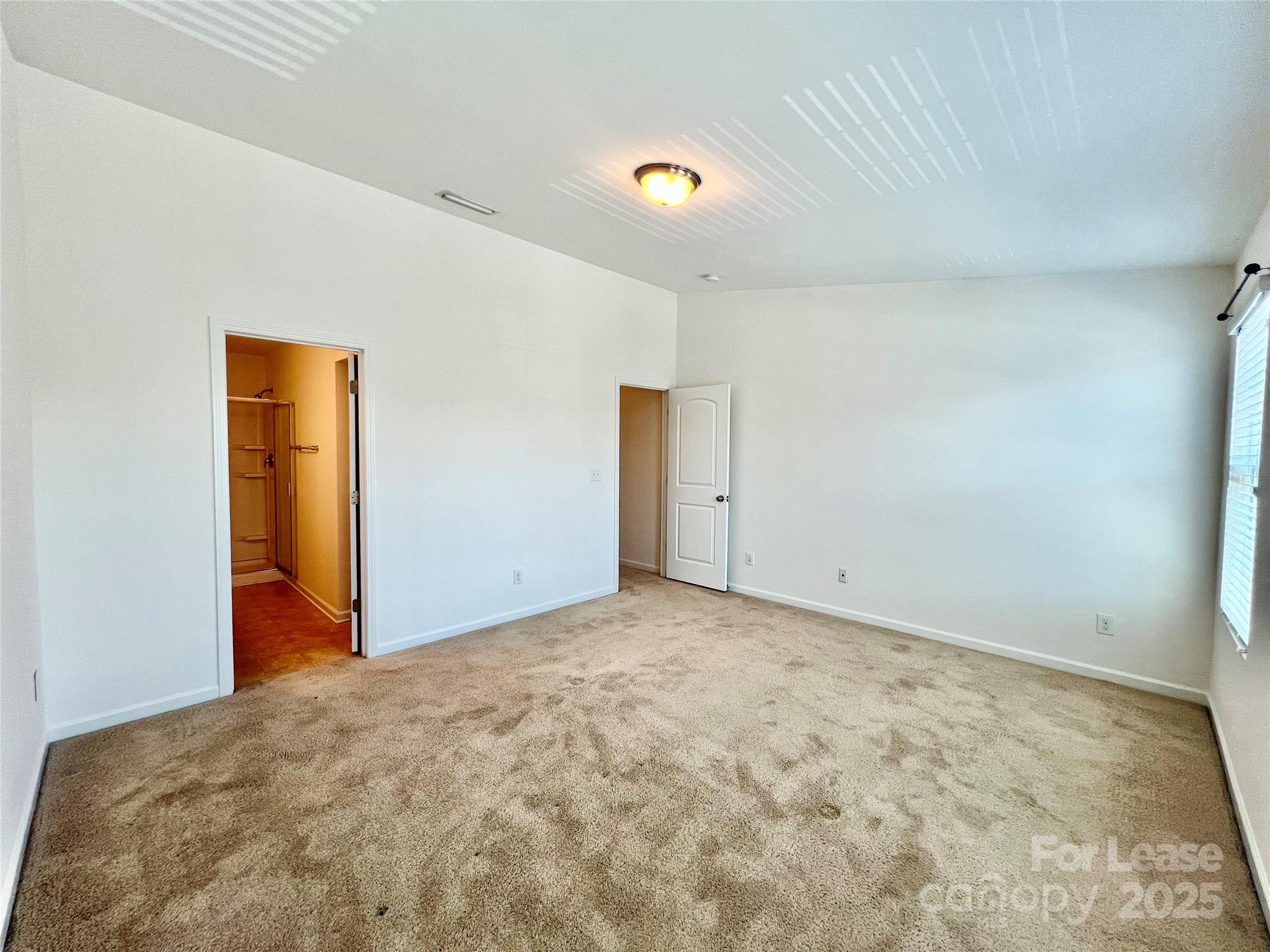 12712 Persimmon Tree Drive Charlotte, NC 28273 - Photo 7 of 9 a view of an empty room