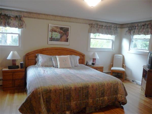 40 Harold Street Sharon, MA 02067 - Photo 13 of 22 a bedroom with a bed and window