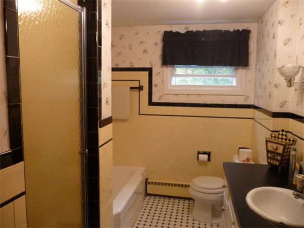 40 Harold Street Sharon, MA 02067 - Photo 17 of 22 a bathroom with a toilet and a sink
