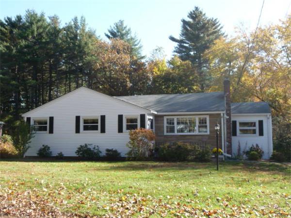 40 Harold Street Sharon, MA 02067 - Photo 22 of 22 front view of a house with a yard
