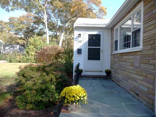 40 Harold Street Sharon, MA 02067 - Photo 3 of 22 a view of a pathway with flower plants