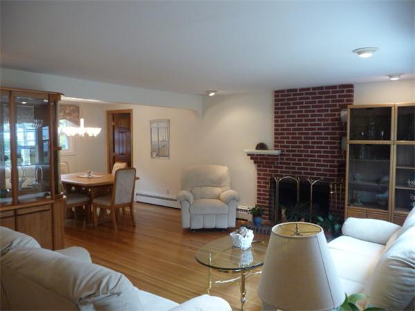 40 Harold Street Sharon, MA 02067 - Photo 4 of 22 a living room with furniture and a fireplace