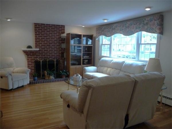 40 Harold Street Sharon, MA 02067 - Photo 6 of 22 a living room with furniture or fireplace and a large window