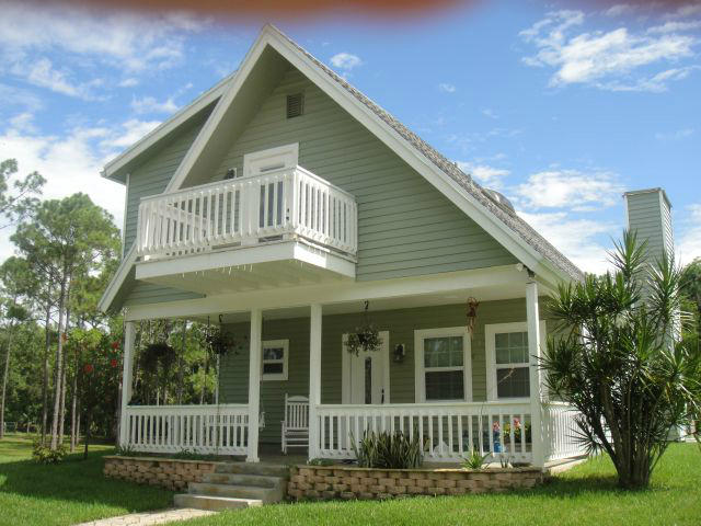 10832 165th Road North Jupiter, FL 33478 - Photo 1 of 8 Front Exterior