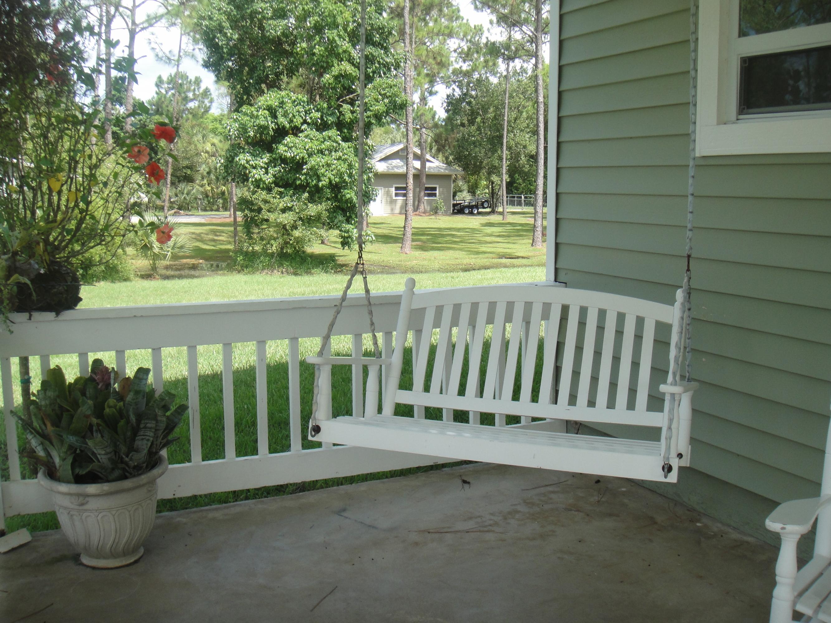 10832 165th Road North Jupiter, FL 33478 - Photo 2 of 8 Front veranda
