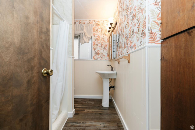 1105 Litz Road Preston, ID 83263 - Photo 13 of 24 Full bath with a wainscoted wall, curtained shower, and wallpapered walls