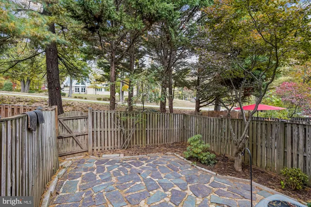 a view of a wrought iron fences in front of house