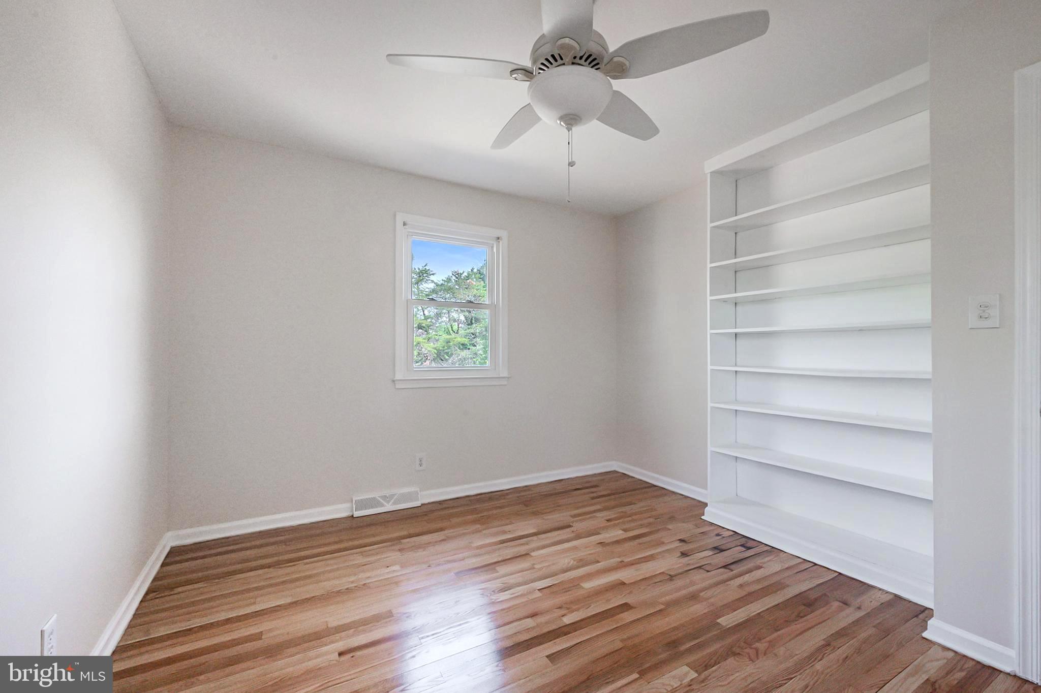4 Phoenix Drive Bear, DE 19701 - Photo 12 of 21 a view of room with a ceiling fan and wooden floor