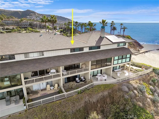 an aerial view of houses with outdoor space