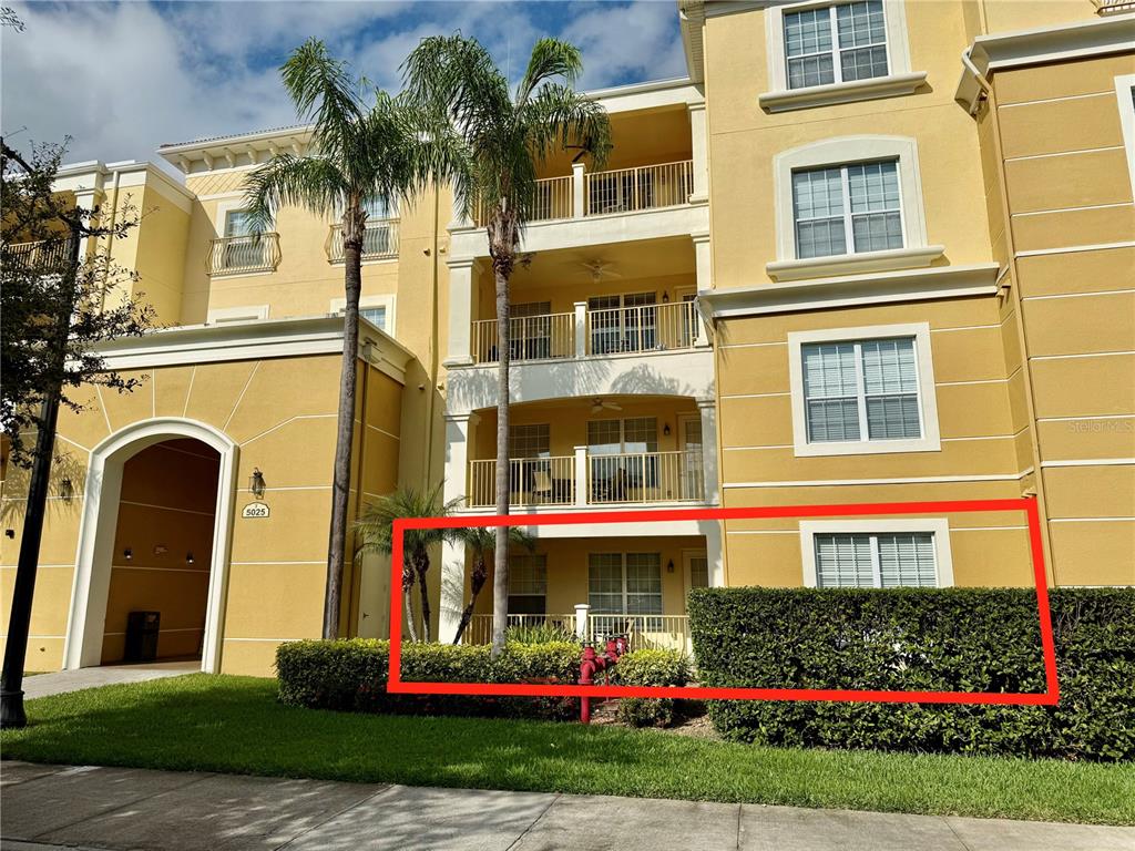 5025 Shoreway Loop, Unit 105 Orlando, FL 32819 - Photo 2 of 55 a front view of a multi story residential apartment building