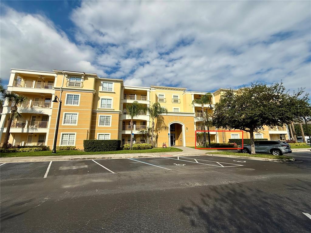 5025 Shoreway Loop, Unit 105 Orlando, FL 32819 - Photo 4 of 55 a view of a building with a street