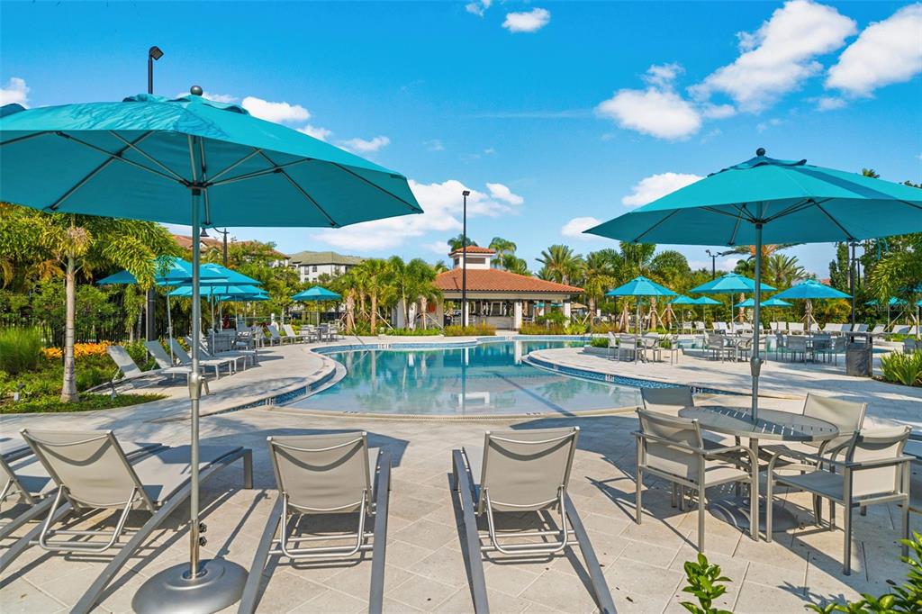 5025 Shoreway Loop, Unit 105 Orlando, FL 32819 - Photo 41 of 55 an outdoor space with patio and outdoor seating