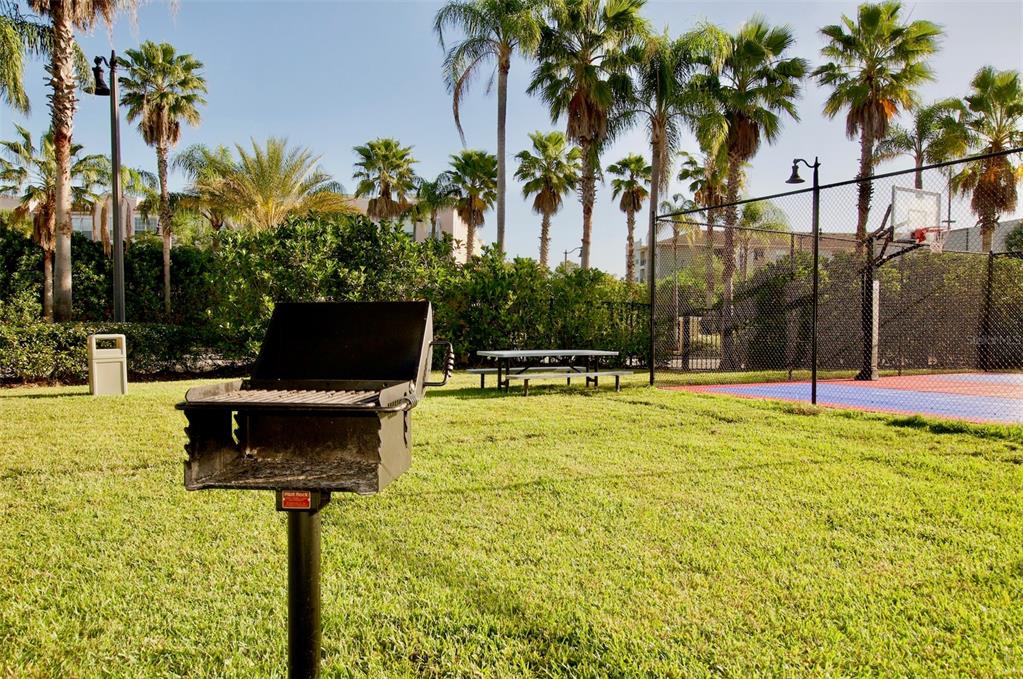 5025 Shoreway Loop, Unit 105 Orlando, FL 32819 - Photo 54 of 55 a swimming pool with some trees