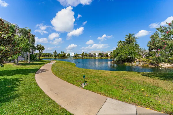 a view of a lake with a building in the background
