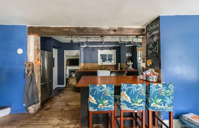 a view of a living room and dining room
