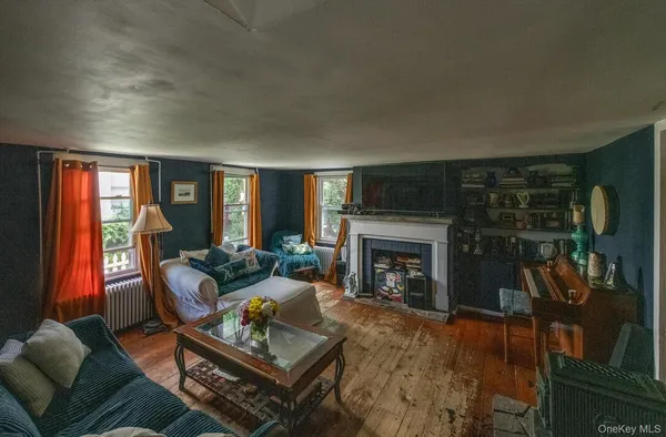 a living room with furniture and windows
