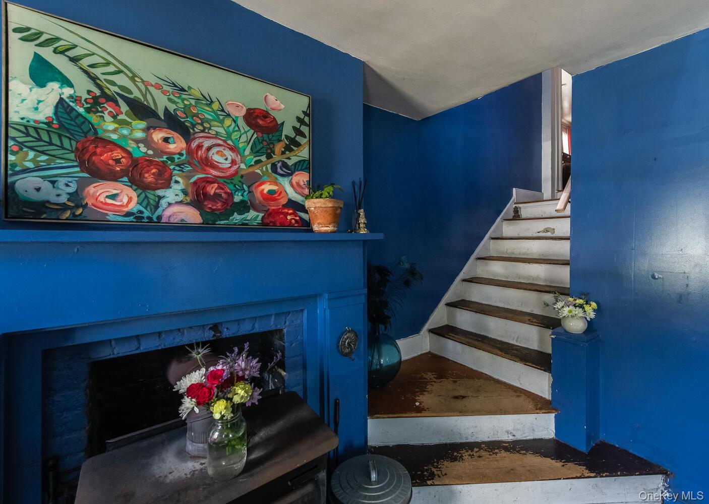 88 South Hamilton Street Poughkeepsie, NY 12601 - Photo 24 of 47 a living room with furniture and a fireplace