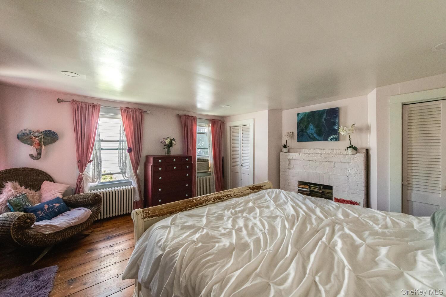 88 South Hamilton Street Poughkeepsie, NY 12601 - Photo 26 of 47 a bedroom with a bed and a couch