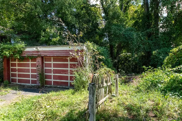 a view of a house with a garden