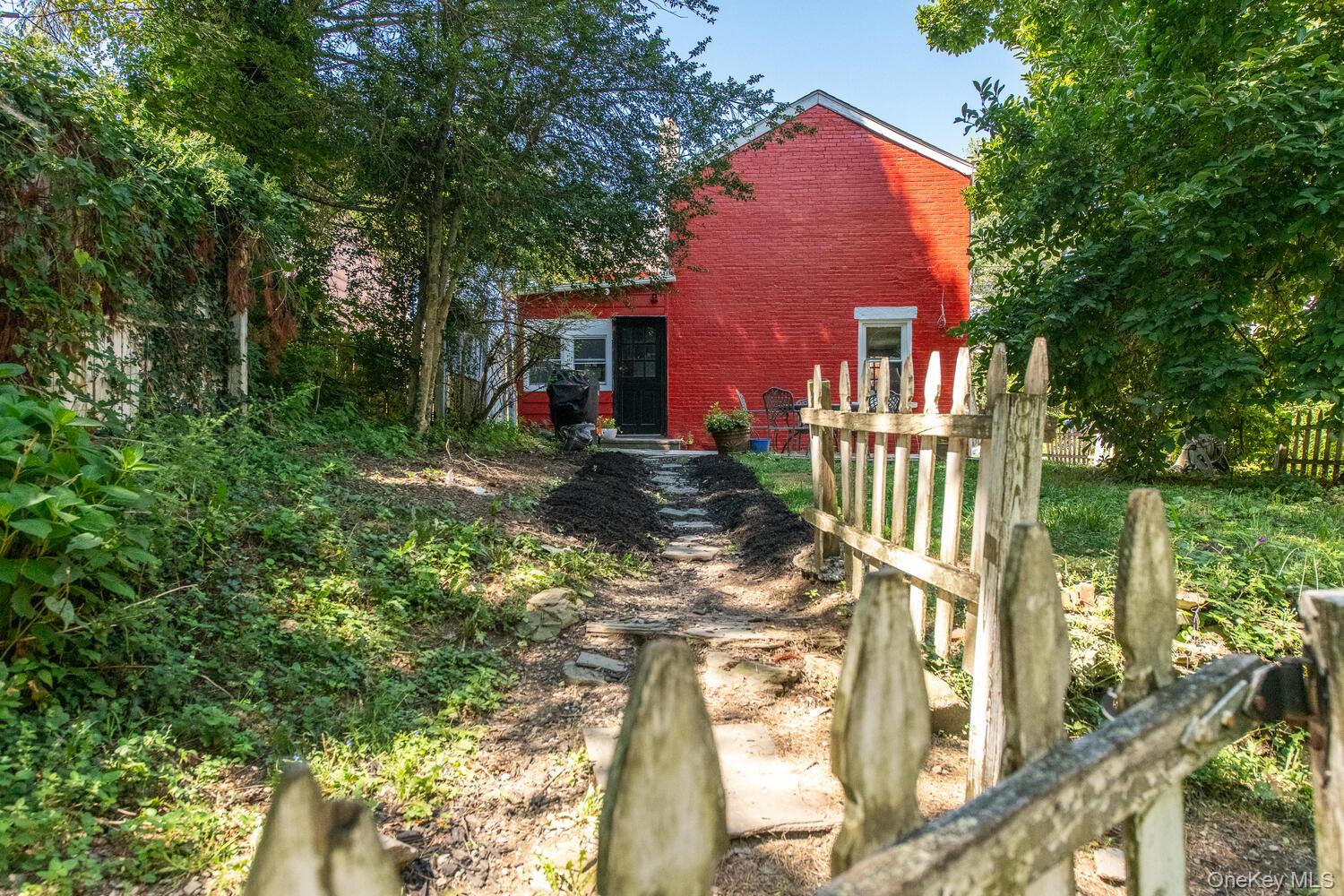88 South Hamilton Street Poughkeepsie, NY 12601 - Photo 43 of 47 a view of a house with a yard and wooden fence