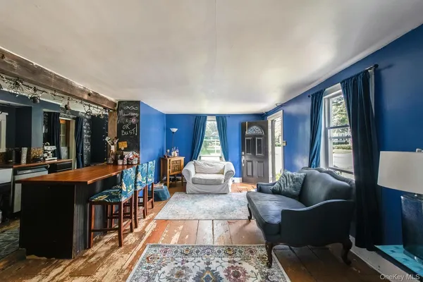 a living room with furniture and a couch