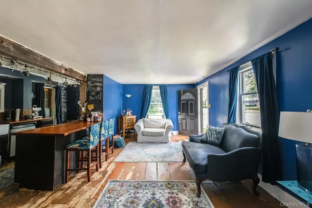 a living room with furniture and a couch