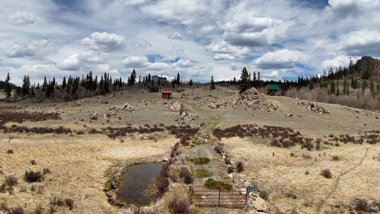 525 Swiggler Road Jefferson, CO 80456 - Photo 1 of 23 View of yard with a view of rural / pastoral area