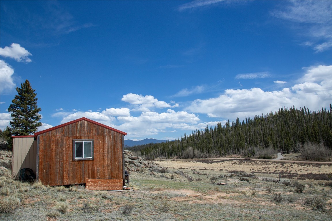 525 Swiggler Road Jefferson, CO 80456 - Photo 4 of 23 View of shed featuring a mountain view