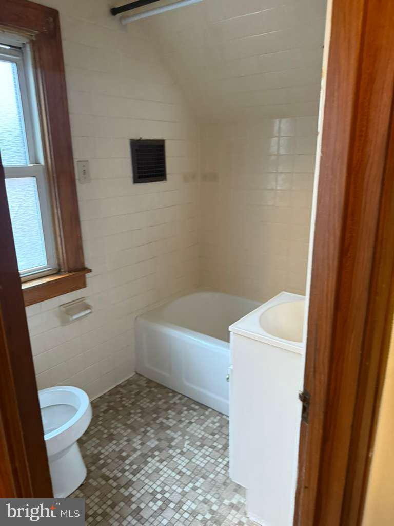 9 West View Terrace Cumberland, MD 21502 - Photo 16 of 21 a bathroom with a toilet and a shower