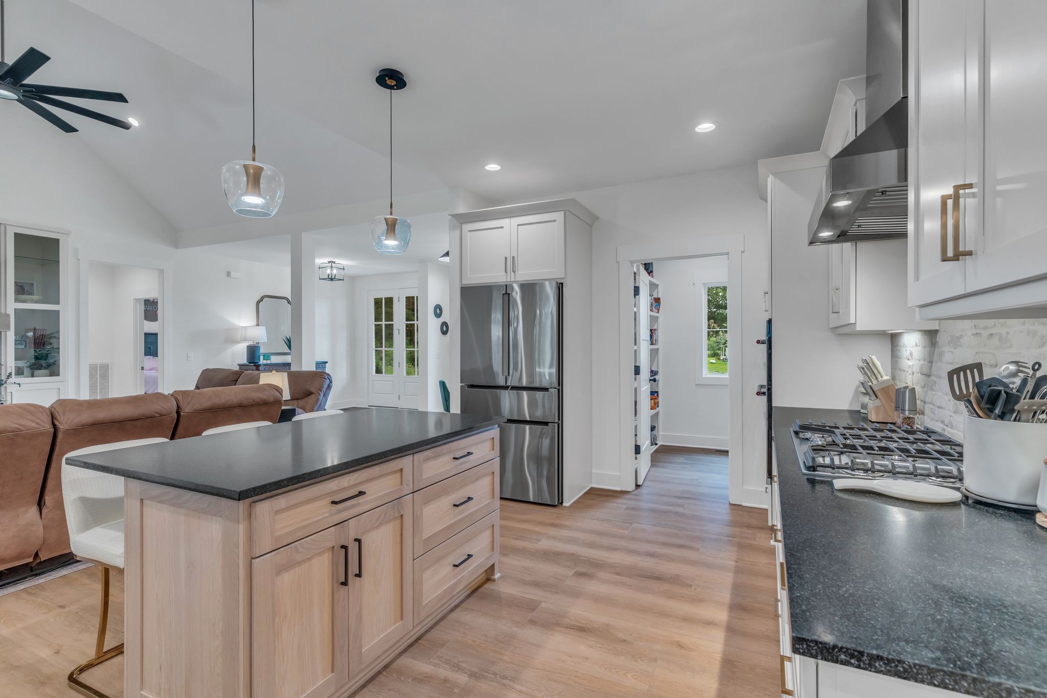 8921 Cedar Grove Road Cross Plains, TN 37049 - Photo 17 of 50 a kitchen with stainless steel appliances granite countertop a sink refrigerator and cabinets