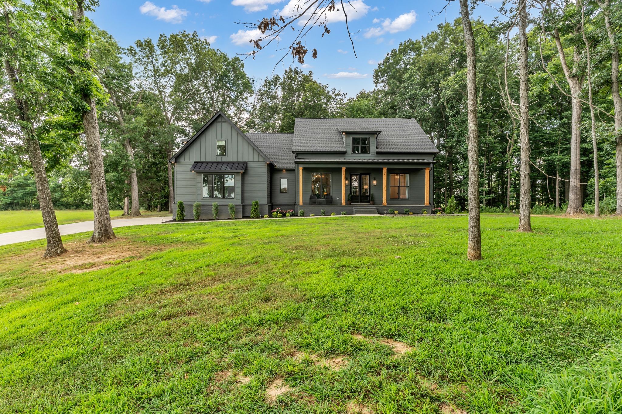 8921 Cedar Grove Road Cross Plains, TN 37049 - Photo 2 of 50 front view of a house with a yard