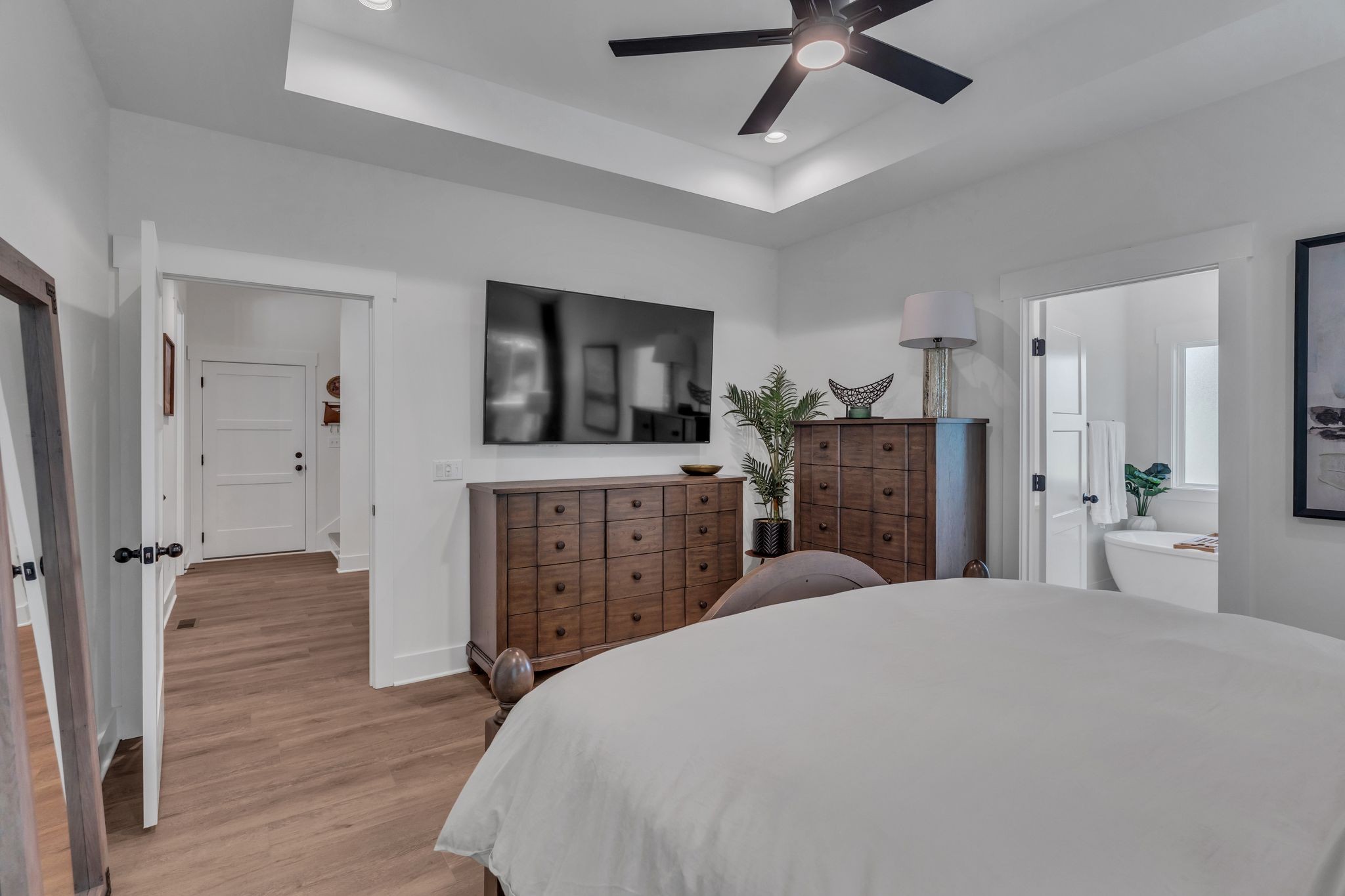 8921 Cedar Grove Road Cross Plains, TN 37049 - Photo 21 of 50 a large bedroom with a bed and wooden floor