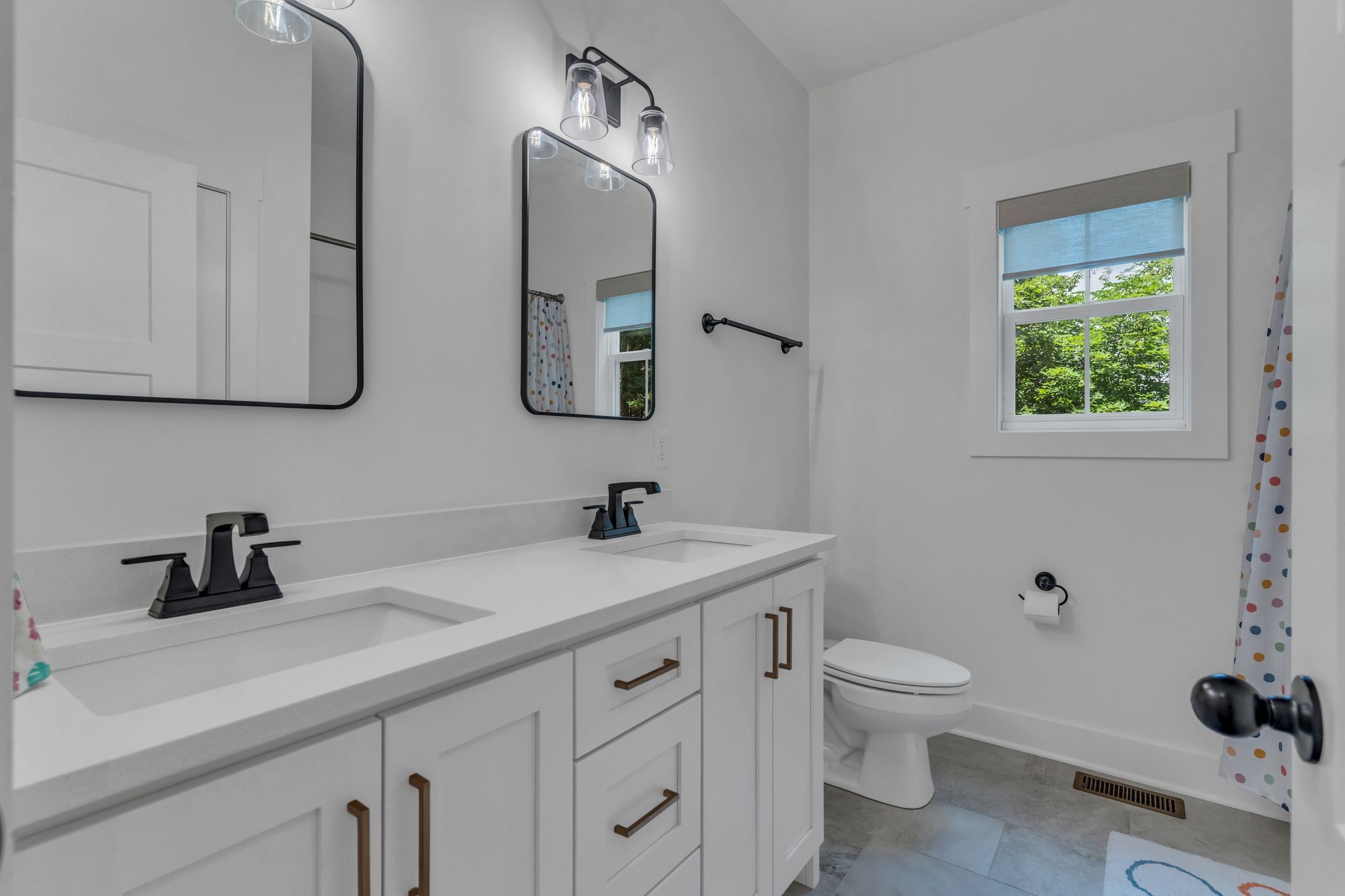 8921 Cedar Grove Road Cross Plains, TN 37049 - Photo 28 of 50 a bathroom with a toilet sink and mirror