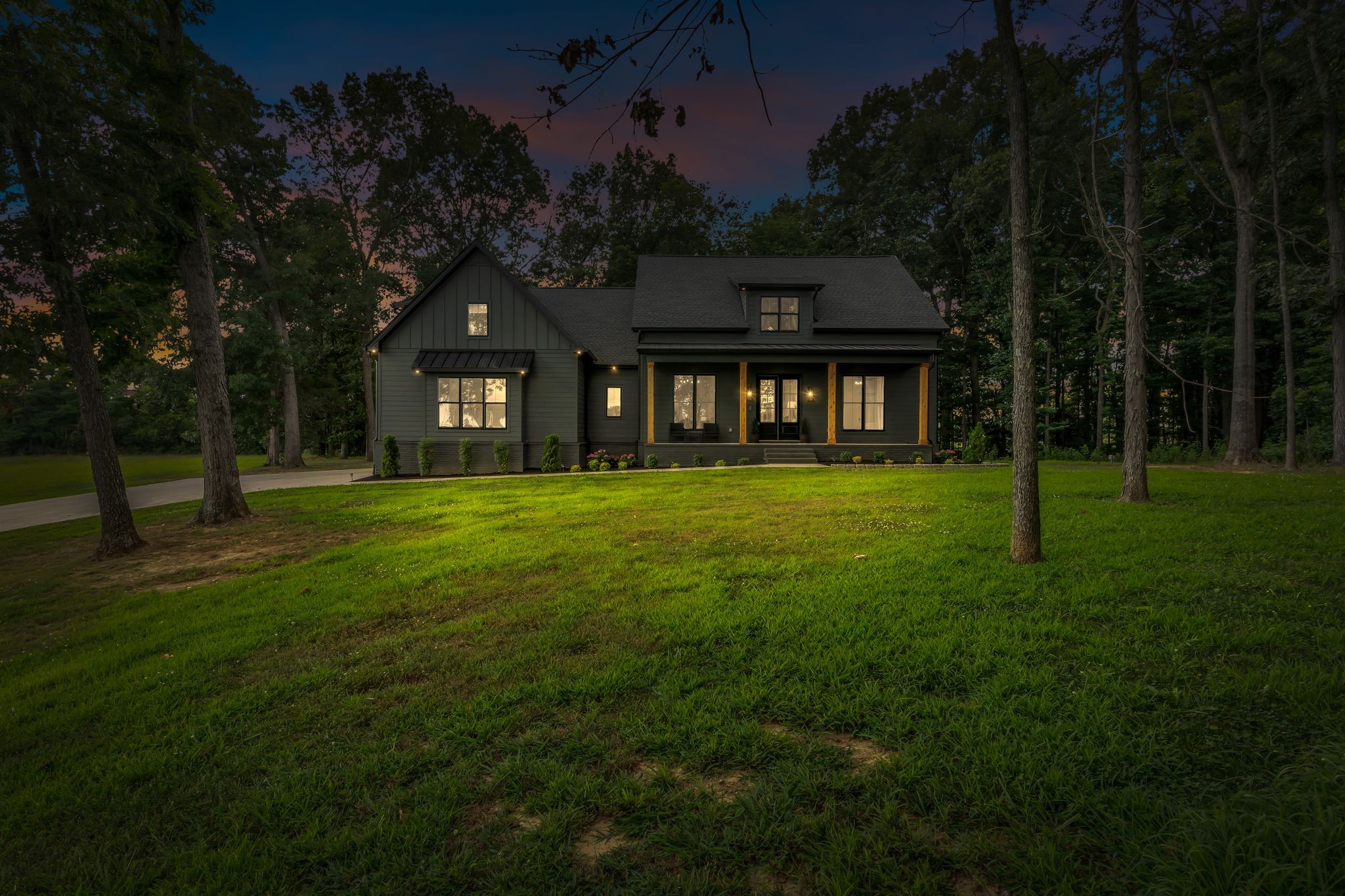 8921 Cedar Grove Road Cross Plains, TN 37049 - Photo 3 of 50 a front view of a house with a garden