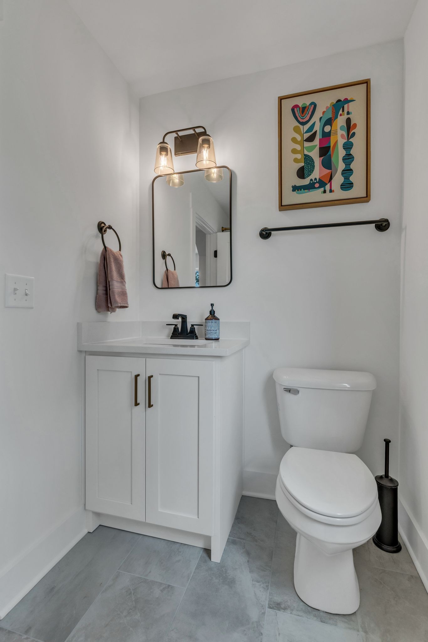 8921 Cedar Grove Road Cross Plains, TN 37049 - Photo 36 of 50 a bathroom with a toilet a sink and mirror