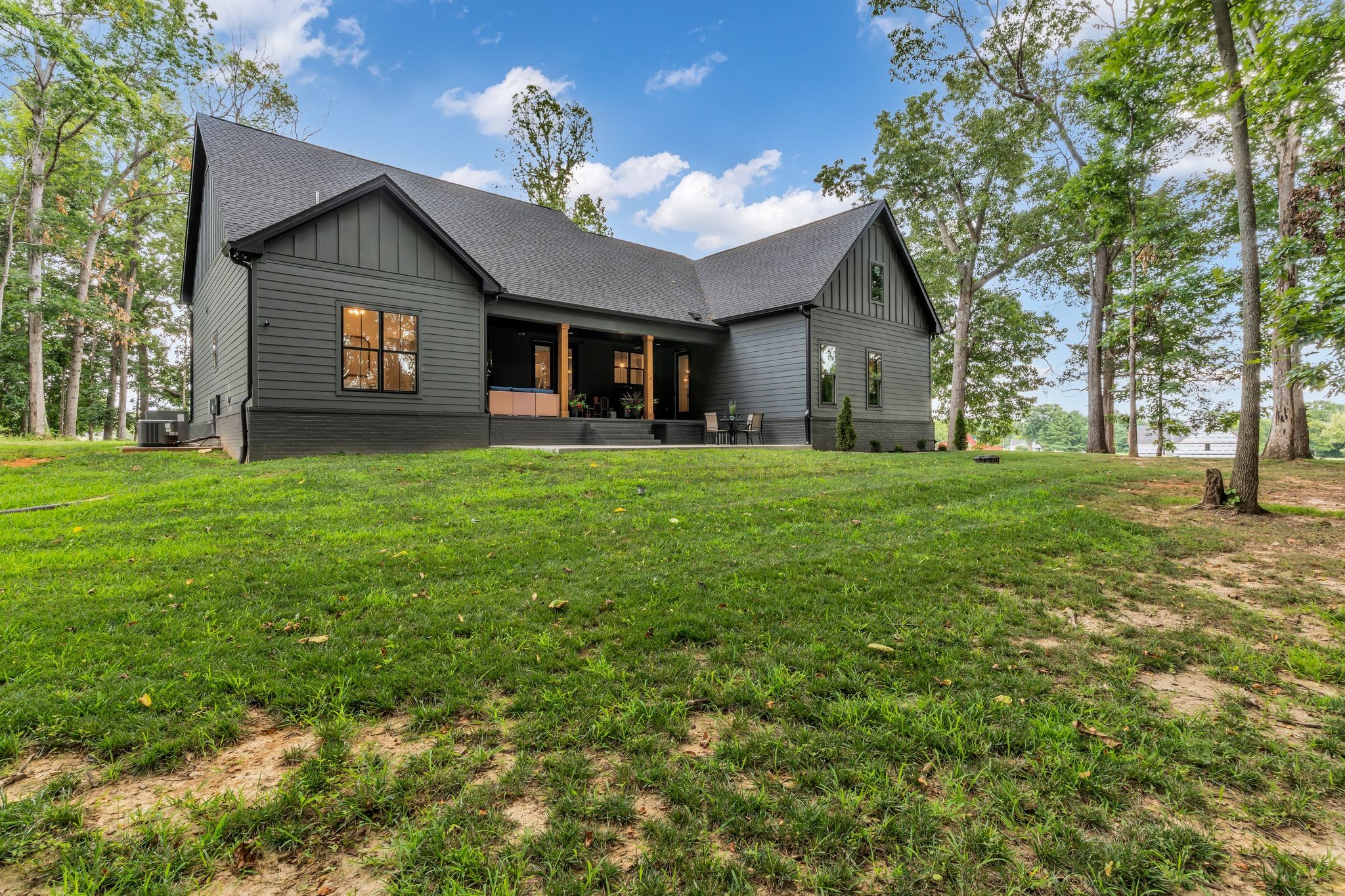 8921 Cedar Grove Road Cross Plains, TN 37049 - Photo 40 of 50 a view of a house with a yard