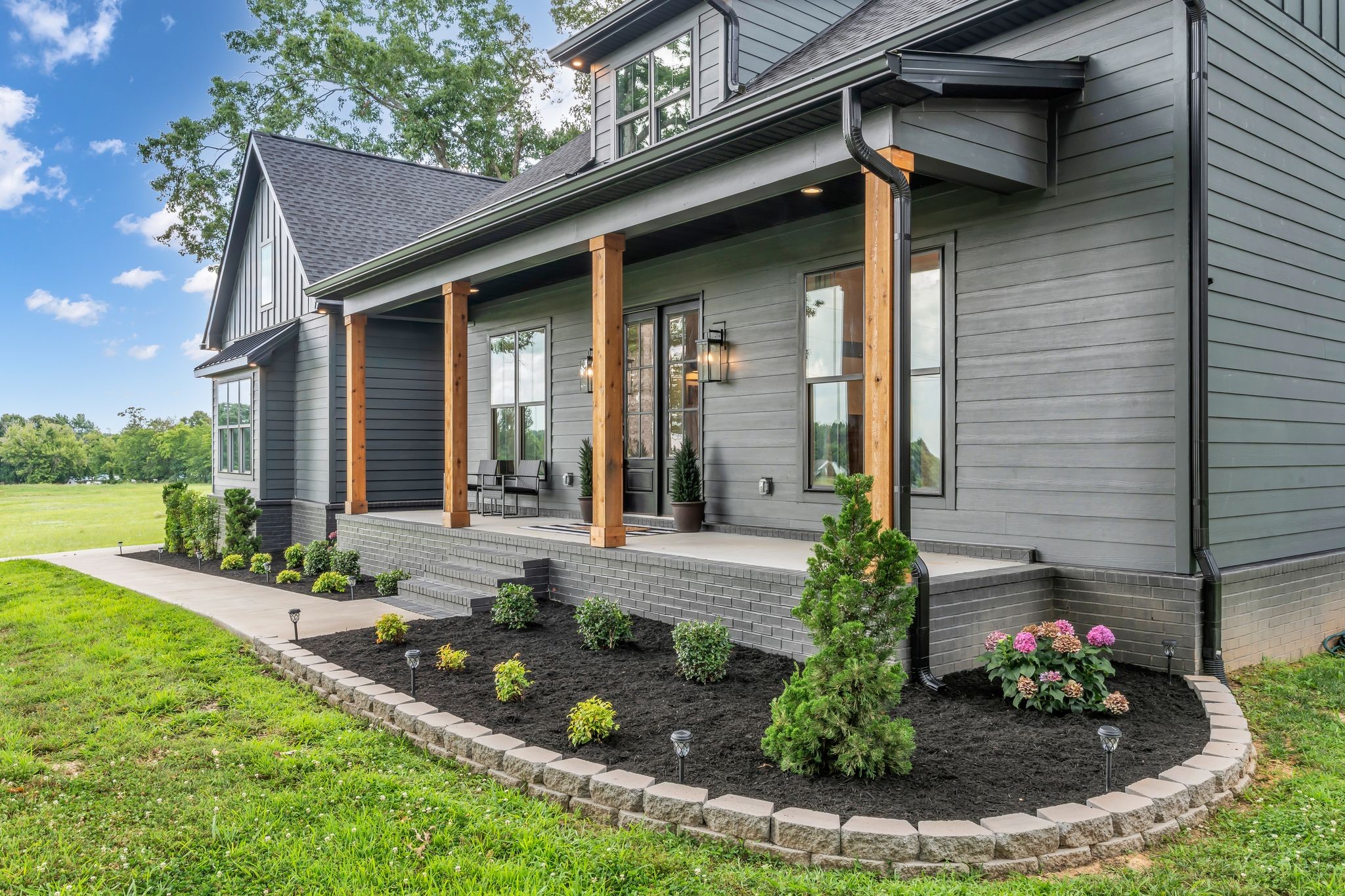 8921 Cedar Grove Road Cross Plains, TN 37049 - Photo 6 of 50 a front view of a house with garden