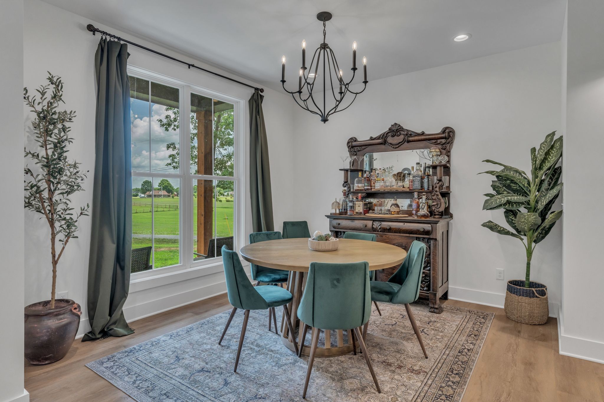 8921 Cedar Grove Road Cross Plains, TN 37049 - Photo 10 of 50 a view of a dining room with furniture window and wooden floor