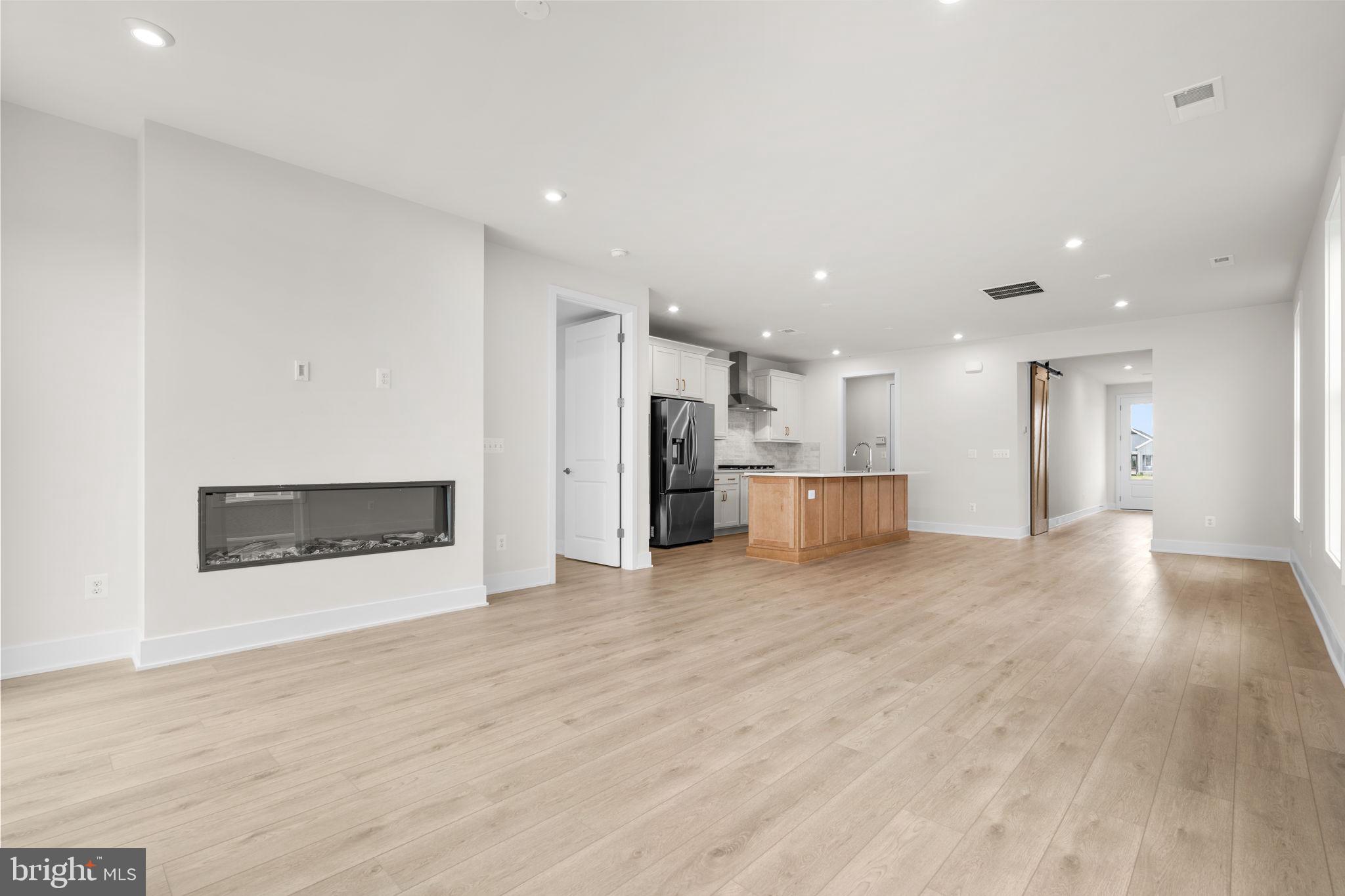 116 Keystone Lane Winchester, VA 22603 - Photo 12 of 42 a view of a kitchen with a sink and a stove top oven
