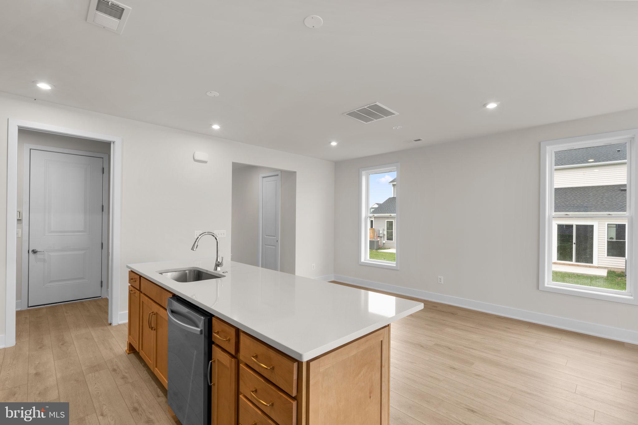 116 Keystone Lane Winchester, VA 22603 - Photo 15 of 42 a kitchen with a sink stove and cabinets
