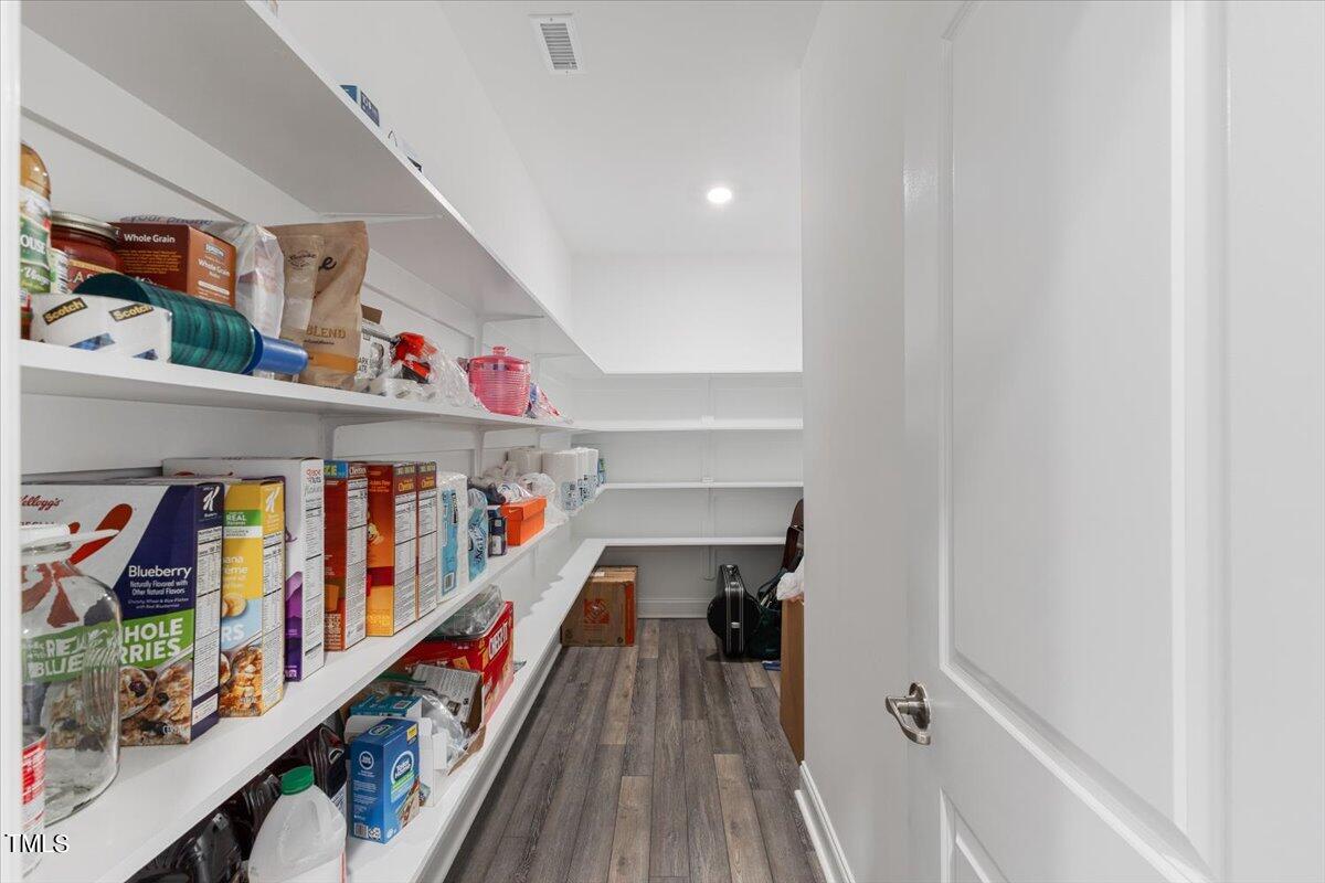 213 Mahogany Run Raleigh, NC 27610 - Photo 19 of 40 a view of stairs and with lots of stuff