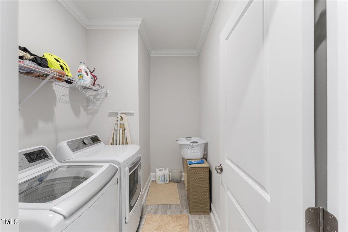 213 Mahogany Run Raleigh, NC 27610 - Photo 20 of 40 a utility room with dryer and washer